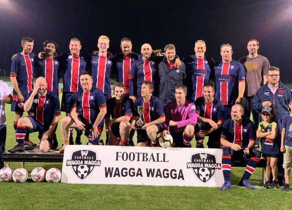 WINNERS: Henwood Park Sparrows celebrate their grand final victory at Equex Centre on Friday night. Picture: Football Wagga