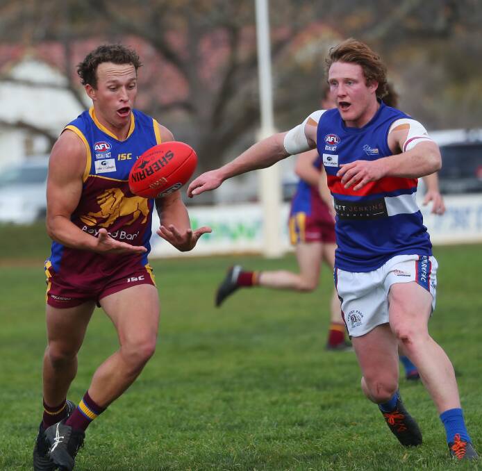 ALL MINE: GGGM's Aaron Proctor looks to get away from Turvey Park's Jackson Hughes at Ganmain Sportsground on Sunday. Picture: Emma Hillier
