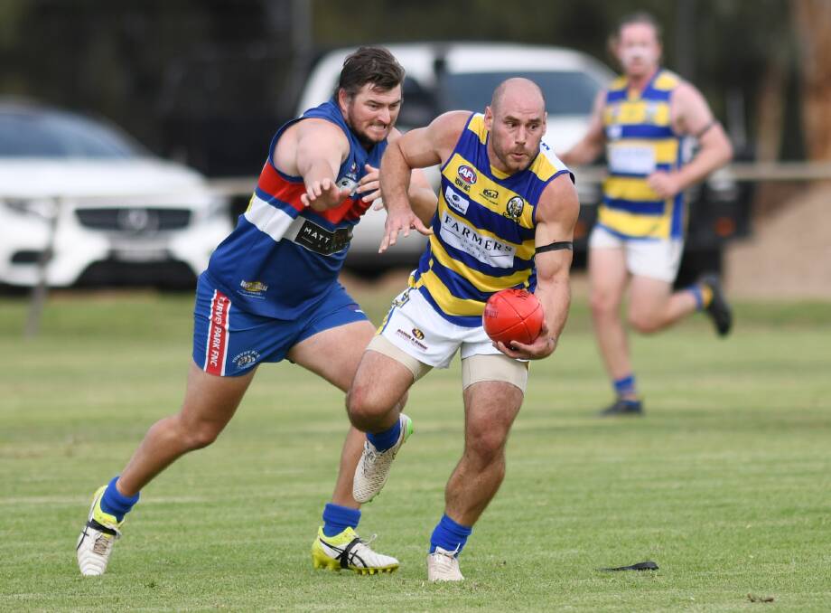 Mitch Sykes in action for Turvey Park against Mangoplah-CUE coach Jeremy Rowe in round one this year. 