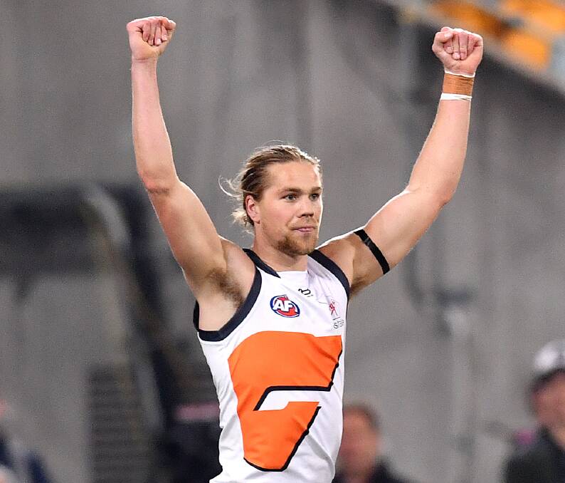 HAPPY DAYS: Greater Western Sydney's Harry Himmelberg celebrates one of the Giants' goals in the semi-final win over Brisbane last Saturday night. Picture: AAP
