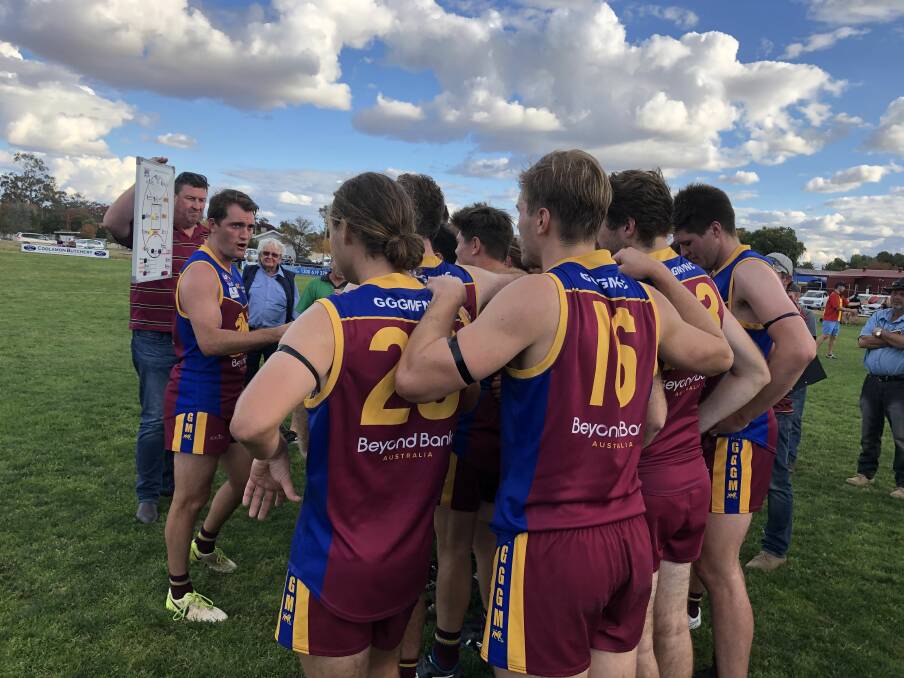 ON TOP: GGGM coach Sam Martyn addresses his troops at three-quarter-time in Sunday's win over Leeton-Whitton at Ganmain Sportsground. Picture: Peter Doherty
