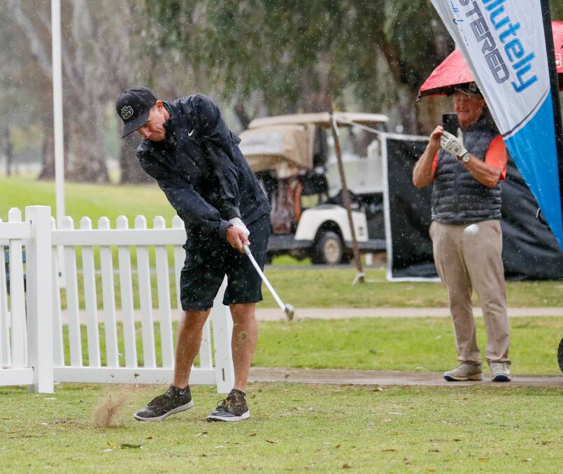 Former US tour professional and media personality Paul Gow tees off on the 14th at the Wagga Country Club on Thursday. Picture by Les Smith