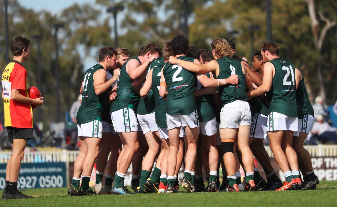 Coolamon players before the opening bounce of Sunday's preliminary final. Picture: Emma Hillier