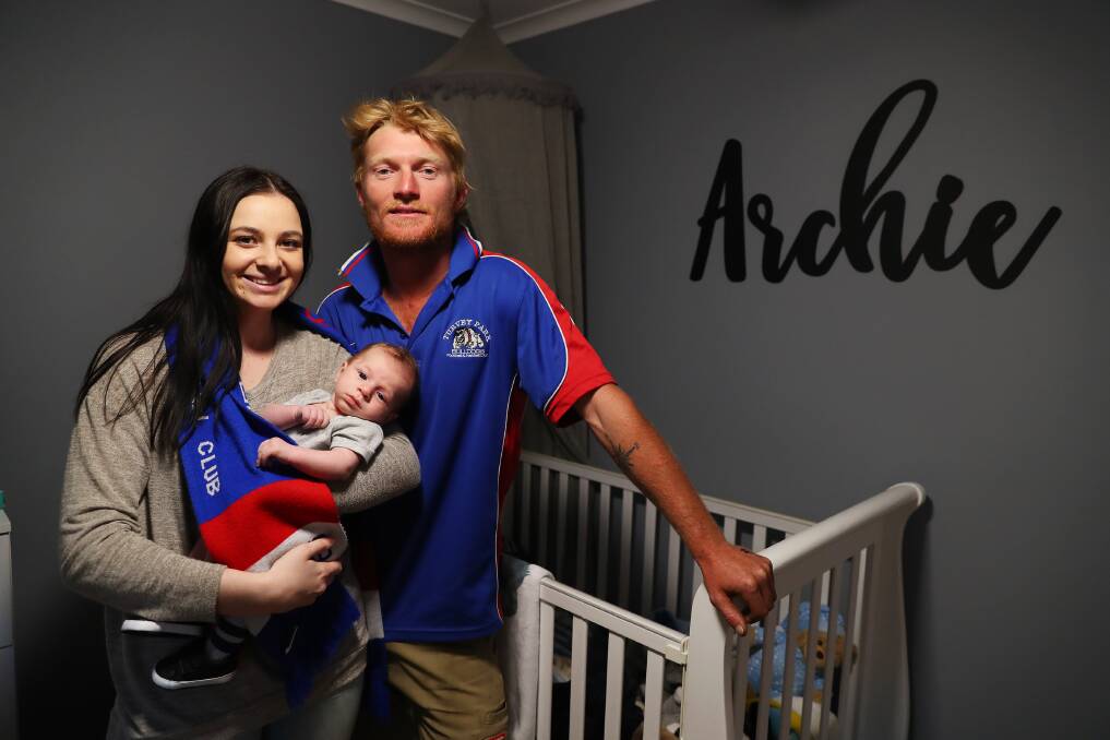 EXCITING TIMES: Turvey Park co-coach Jeremy Sykes with fiancee Tiana and baby Archie at home in Wagga on Friday. Picture: Emma Hillier