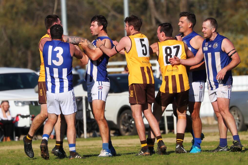Temora and East Wagga-Kooringal players sort out their differences in last weekend's final round game at Gumly Oval.