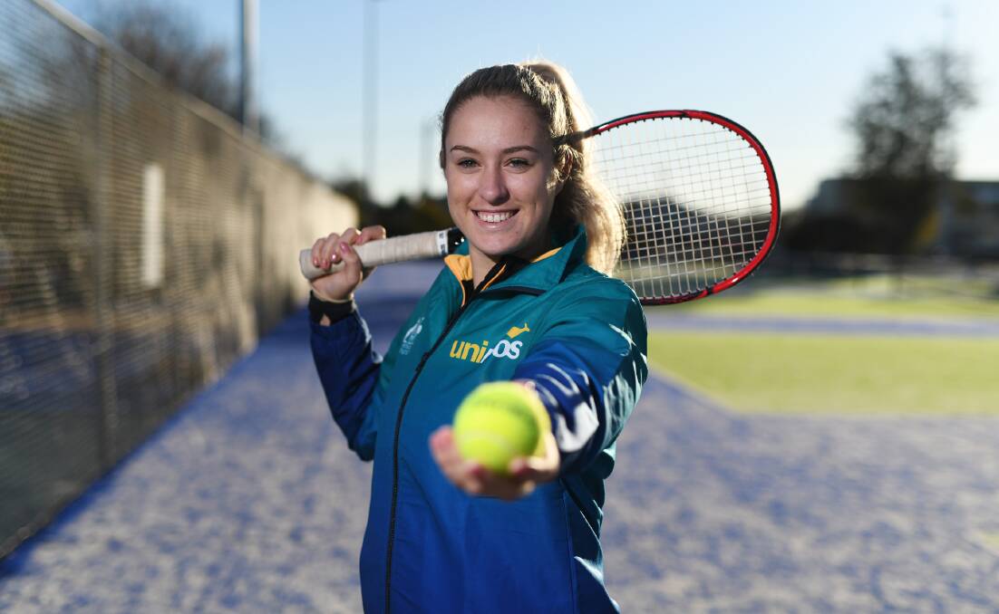 TEENAGE TALENT: Wagga's Kaitlin Staines is all smiles at South Wagga Tennis Club on Thursday ahead of her trip to Italy next week. 