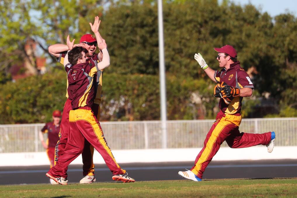 GOOD START: Lachie and Nic Skelly celebrate a Wagga RSL wicket with Lake Albert captain Kurt Robertson at Wagga Cricket Ground on Saturday. Picture: Emma Hillier