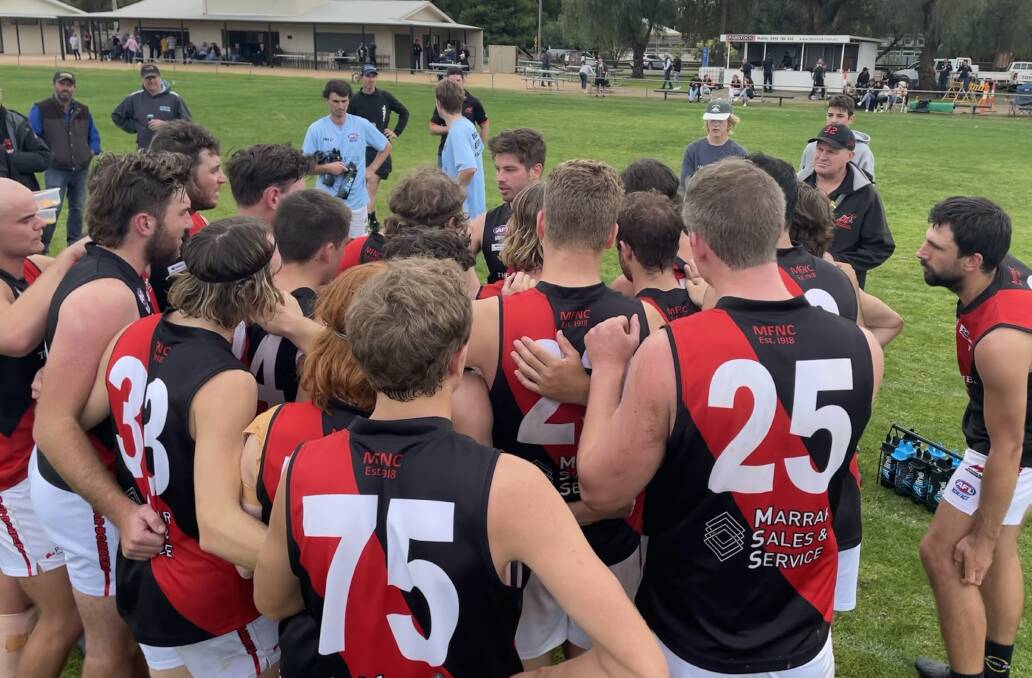 ON SONG: Marrar assistant coach Cal Gardner addresses the troops during one of the breaks against Barellan on Saturday. 