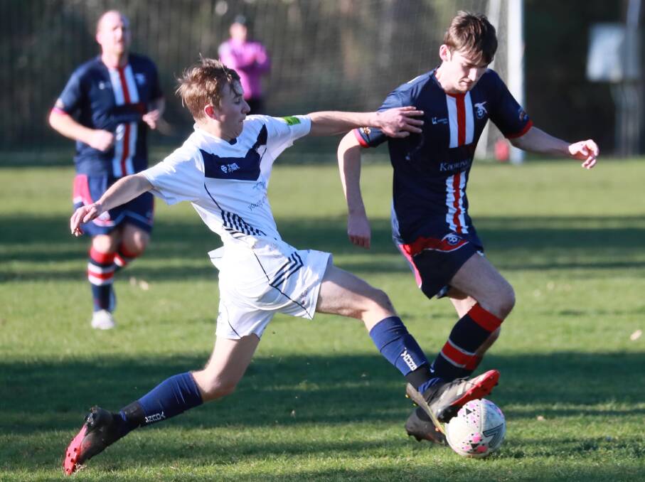 WAITING GAME: Young's Alex Freeman tries to stop Henwood Park's Cameron Weir in the Pascoe Cup game earlier this month.