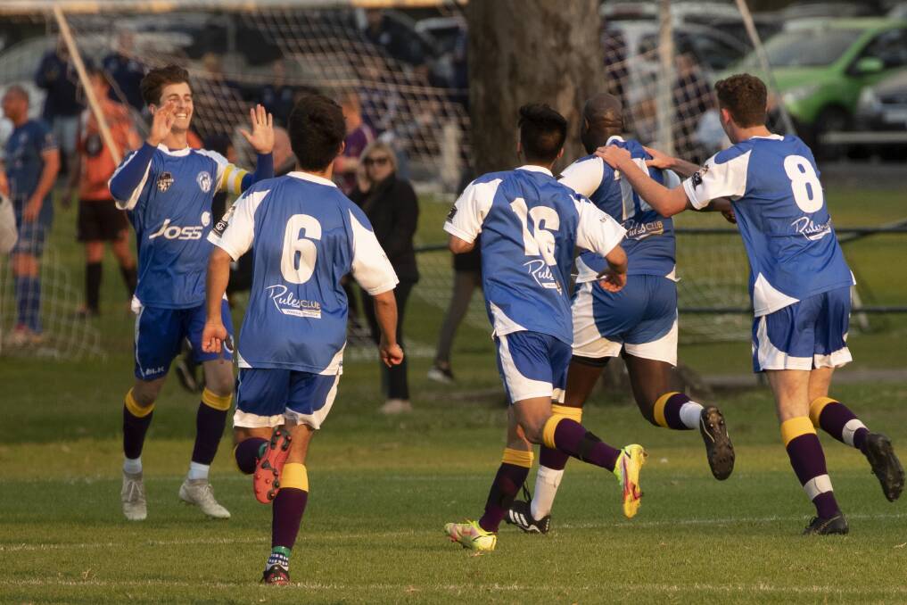 PARTY TIME: Tolland captain Nick Tsipiras looks to celebrate with goalscorer Daniel Okot as the Wolves went 2-0 up over South Wagga at Rawlings Park on Sunday. Picture: Madeline Begley