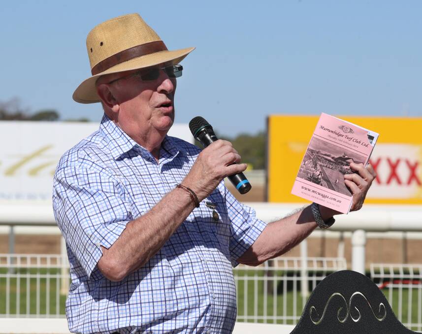 Rodney Parsons OAM presents the trophy for this year's Rodney Parsons Cup. Picture: Les Smith