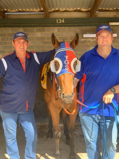 WINNERS ARE GRINNERS: Wagga trainer Trevor Sutherland (left) and stable foreman Shane Wilson with Charming Pat at Murrumbidgee Turf Club on Sunday. Picture: Trevor Sutherland Racing
