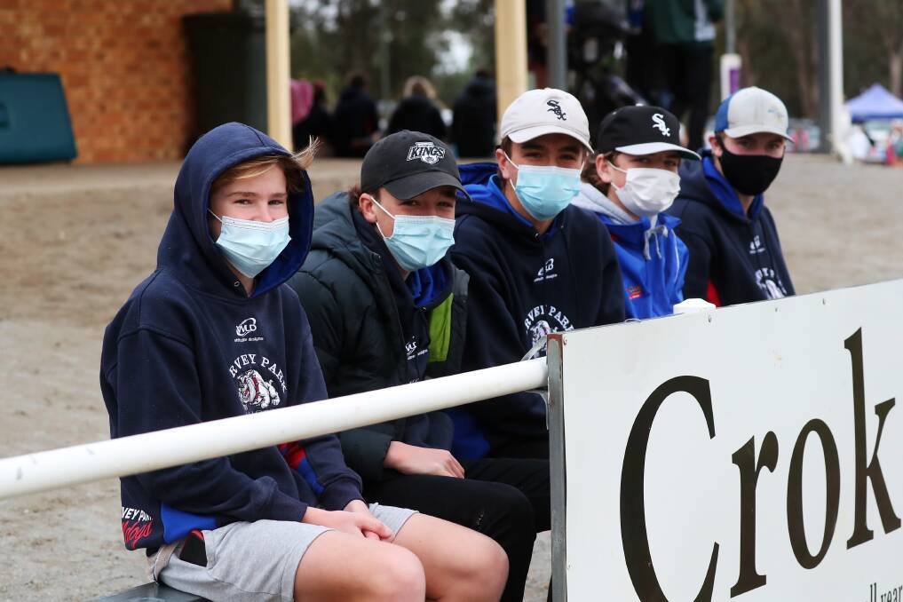 MASKED UP: Michael Thomas, 15, Harry Isaac, 15, Jack Glanvill, 16, Charlie Stratton, 16 and Max Charleson, 17, at Kindra Park on Sunday. Picture: Emma Hillier