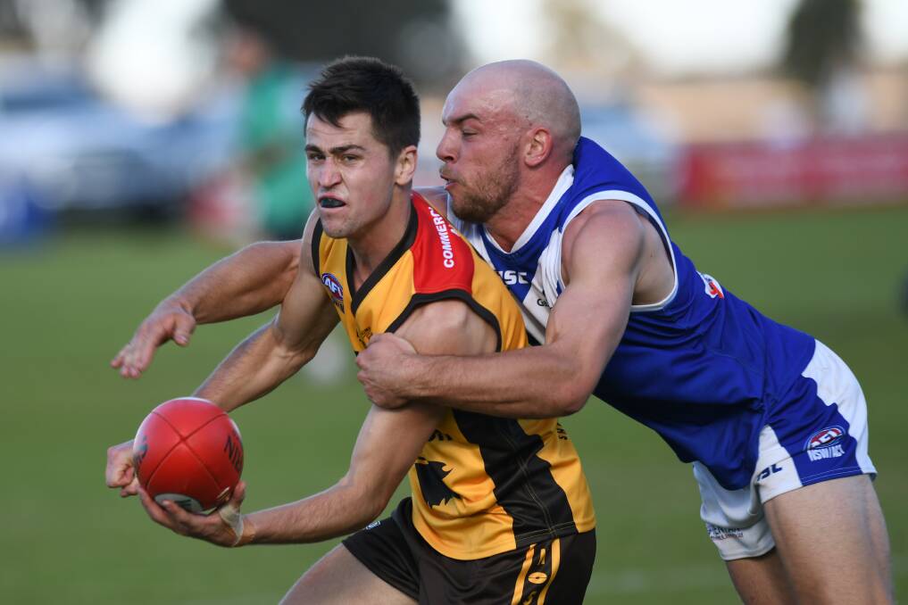GOTCHA: Farrer's Brayden Ambler reels in Hume's Ryan Speed in the representative game between the two leagues last year. 