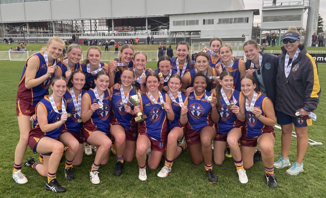 CHAMPIONS: Mater Dei Catholic College's open girls team celebrate their win over Kildare Catholic College at Robertson Oval on Wednesday. Picture: Matt Malone