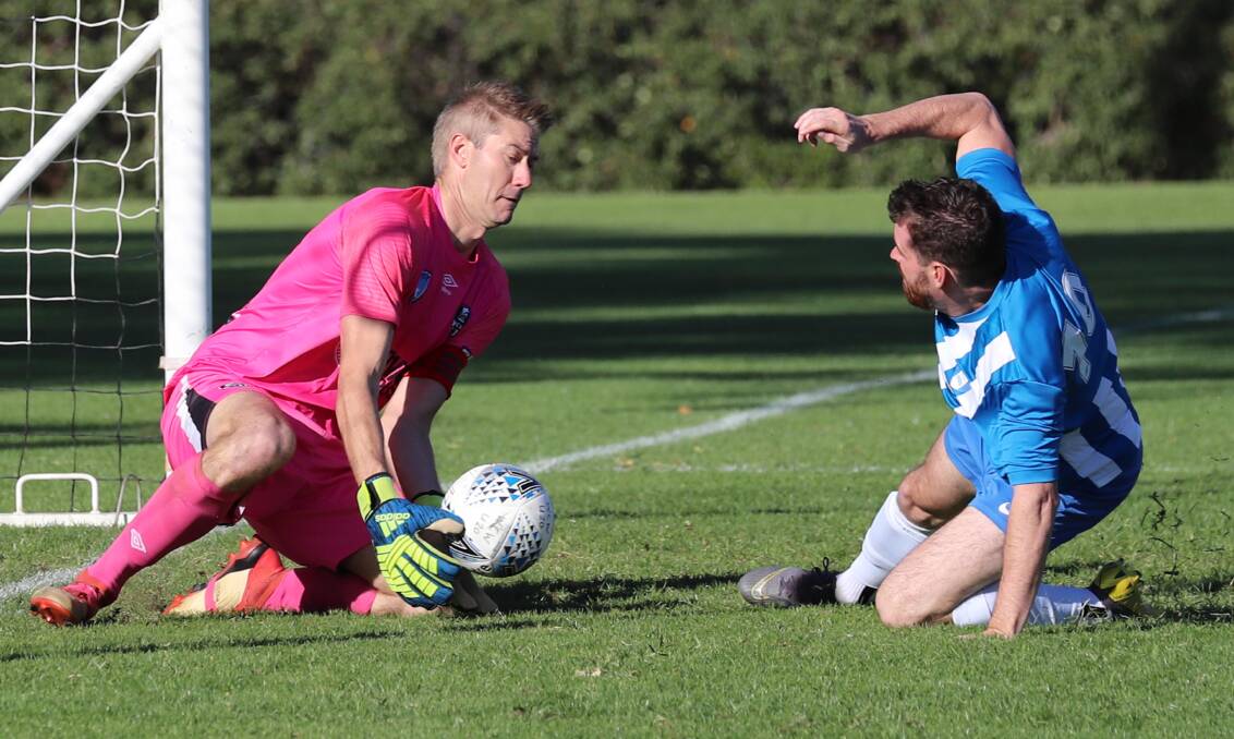 TOUGH START: Wagga City Wanderers keeper Robert Fry in action against ANU at Gissing Oval last year. Picture: Les Smith