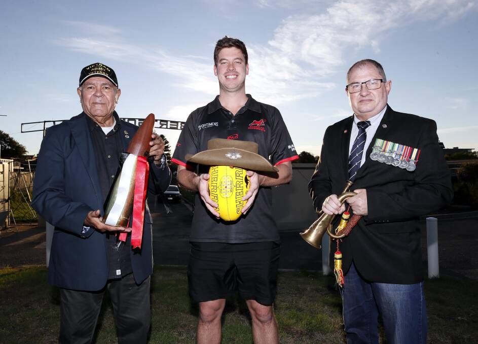 LEST WE FORGET: Vietnam veterans (left) Hewitt Whyman and Richard Salcole (right) with Marrar assistant coach Cal Gardner ahead of Saturday's ANZAC Challenge at Langtry Oval. Picture: Les Smith