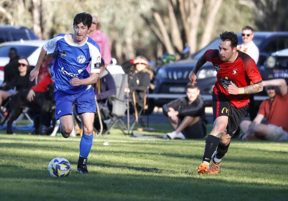 ON THE RUN: Tolland's Nick Young looks to send his team into attack in the Pascoe Cup game against Lake Albert at Rawlings Park on Sunday. Picture: Les Smith