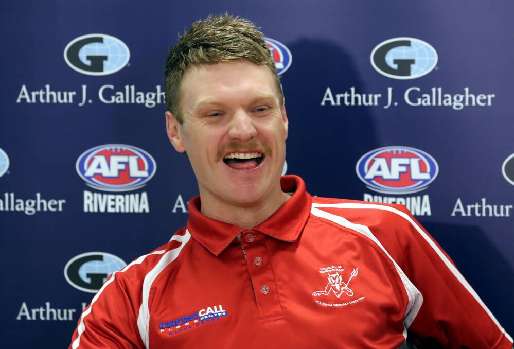 STRONG POSITION: Collingullie-Glenfield Park coach Luke Gestier shares a laugh at Thursday's grand final media conference at AFL House. Picture: Les Smith