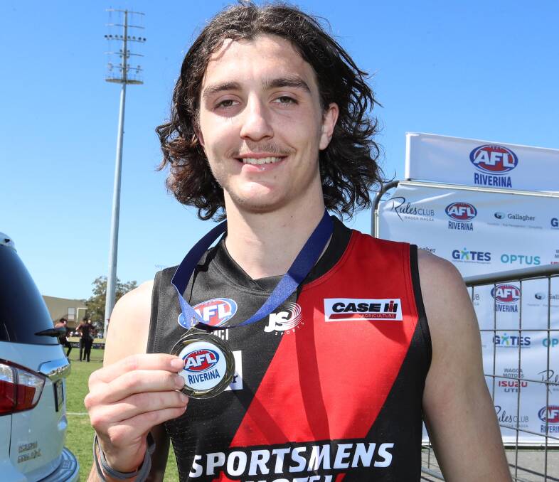 Drew Beaven with his best-on-ground medal in the under 17.5 grand final.