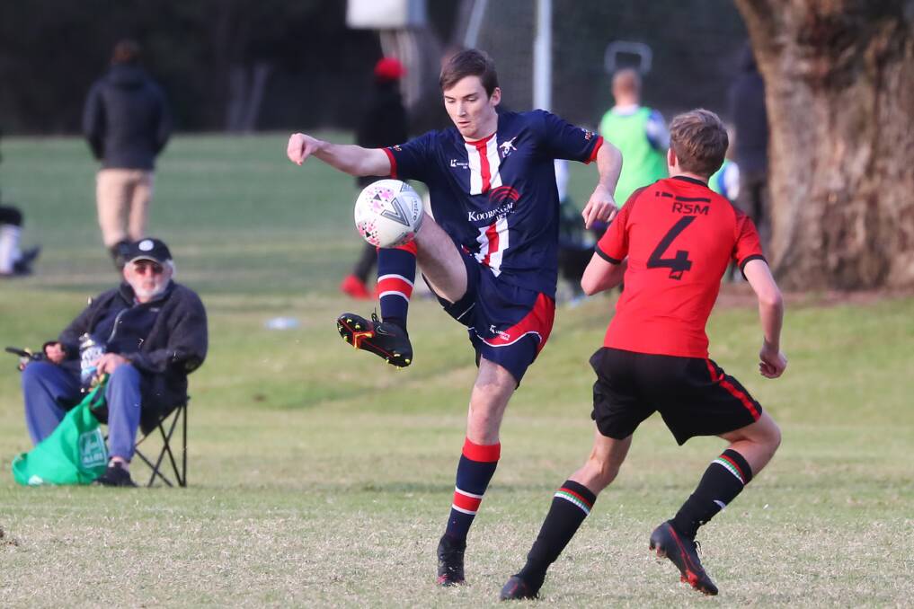 SHOWDOWN: Henwood Park's Cameron Weir plays the ball in the game against Lake Albert earlier in the season. Picture: Emma Hillier