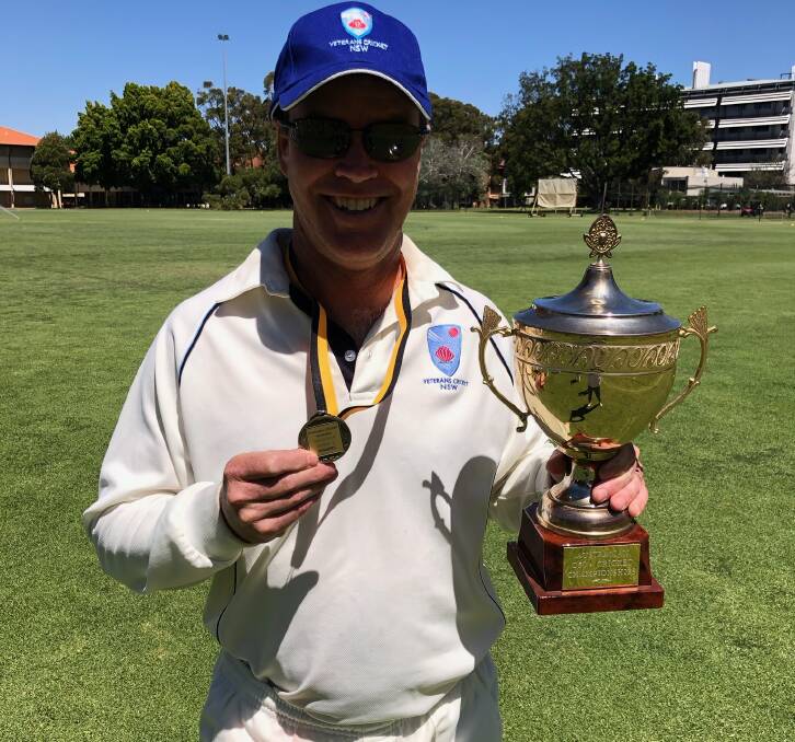 SUCCESS: Wagga cricketer Eric Koetz with the division two title that he helped NSW Kangaroos win at the Australian Veterans National Over 50s Championships.