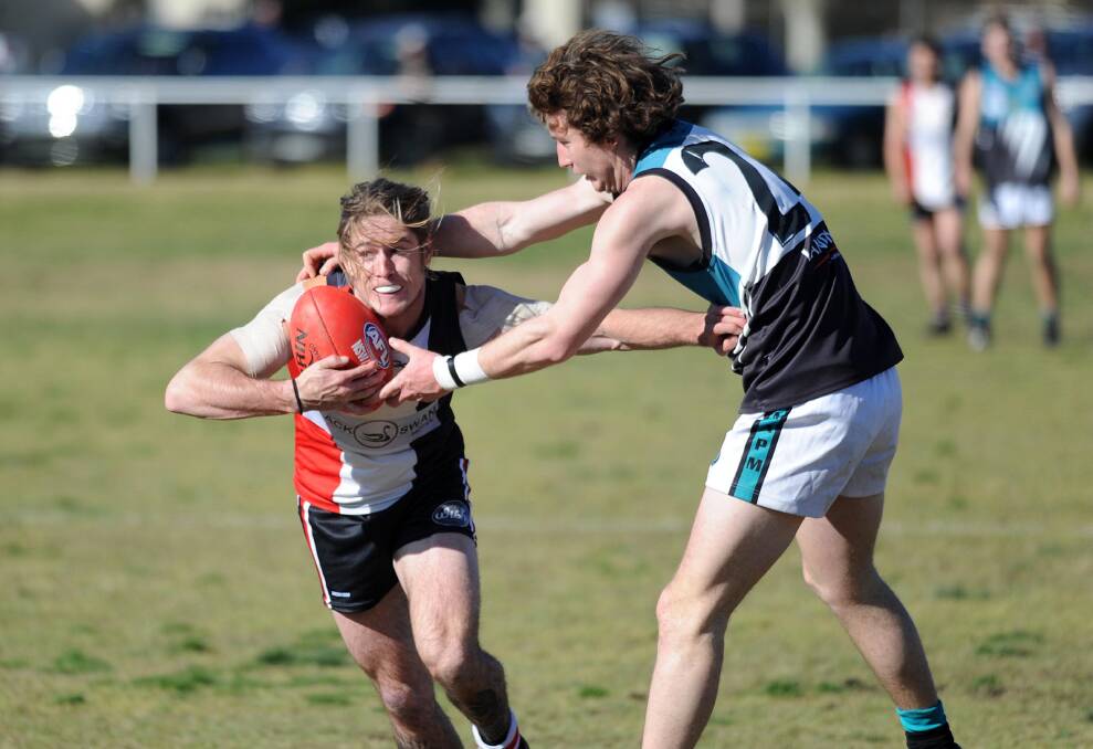 Paddy Bray in action for Northern Jets in 2017, trying to tackle North Wagga's Corey Watt.