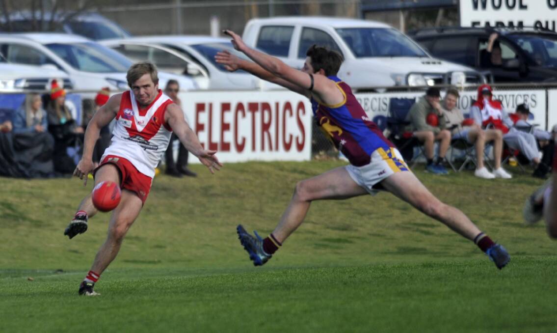 IN DOUBT: Ben King in action against Ganmain-Grong Grong-Matong during last year's finals campaign. 