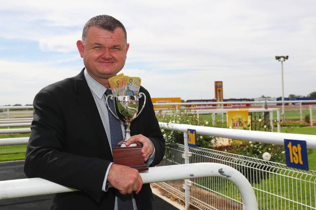 CASHED UP: Murrumbidgee Turf Club chief executive Scott Sanbrook is all smiles after announcing an increase in prizemoney for the Wagga Gold Cup. Picture: Emma Hillier