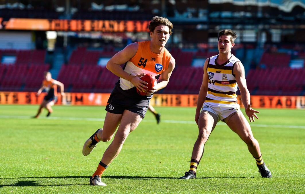 GIANT IN THE MAKING? Liam Delahunty in action for Greater Western Sydney's NEAFL team against Aspley last month. Picture: Keith McInnes
