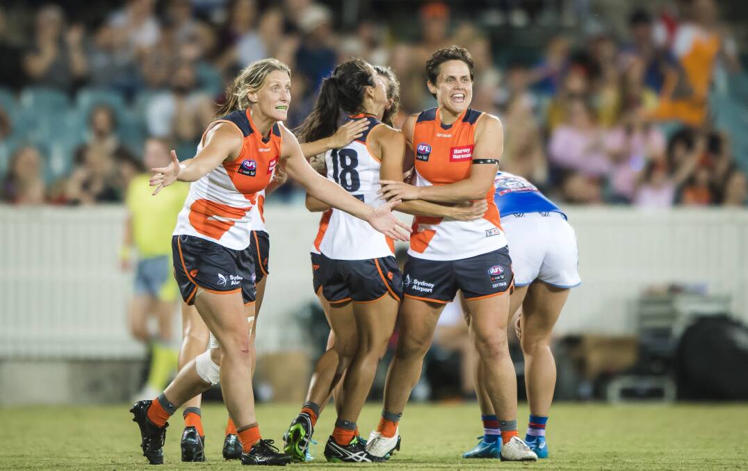 WE'RE COMING TOO: Greater Western Sydney celebrate an Amanda Farrugia goal in the game against Western Bulldogs in Canberra last year. Picture: Sitthixay Ditthavong