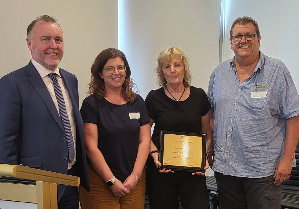 Narrandera Race Club is presented with their award on Friday. Picture supplied