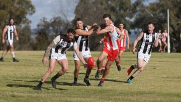 The Rock-Yerong Creek forward Dean Biermann looks to swoop on a loose ball in the Farrer League game against Charles Sturt University at Peter Hastie Oval on Saturday. Picture by Tom Dennis