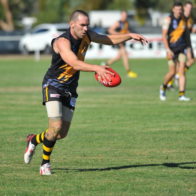 NEW BEGINNING: Alex Lawder in action at Queanbeyan. He has
accepted the senior coach role at Barellan this season.