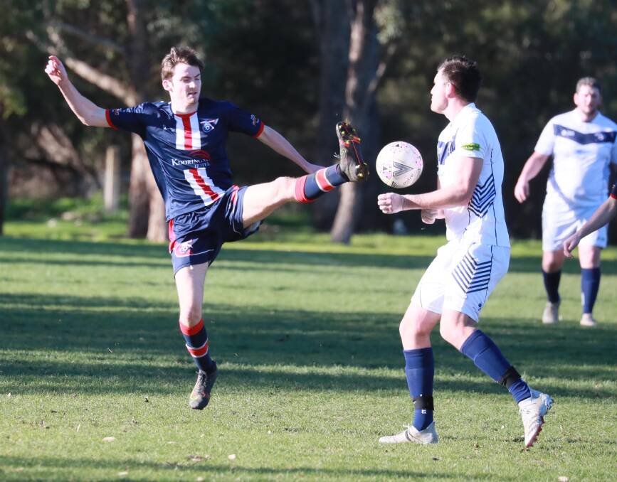 CLOSE CALL: Henwood Park's Cameron Weir gets his boot high when competing with Young's Jarod Schiller in the Pascoe Cup game at Rawlings Park on Sunday. Picture: Les Smith