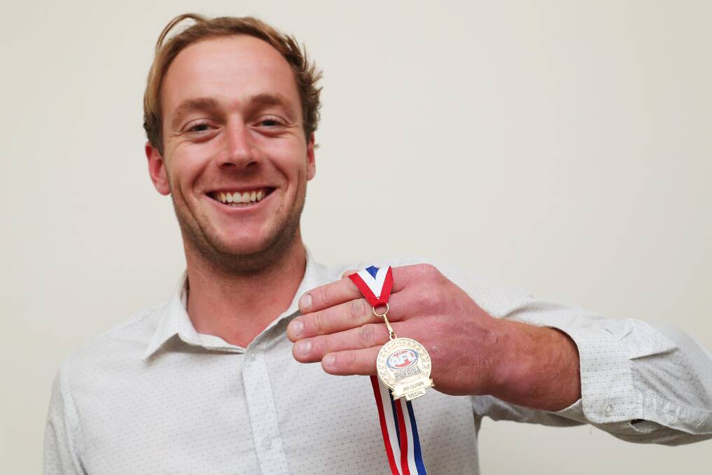 SURPRISE: Narrandera coach Jarred Lane shows off his Jim Quinn Medal at Narrandera Ex-Servicemen's Club on Tuesday night. Picture: Emma Hillier