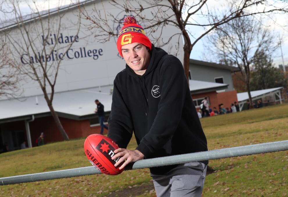HAPPY DAYS: Ganmain-Grong Grong-Matong footballer Riley Corbett at school at Kildare Catholic College on Friday. Picture: Les Smith