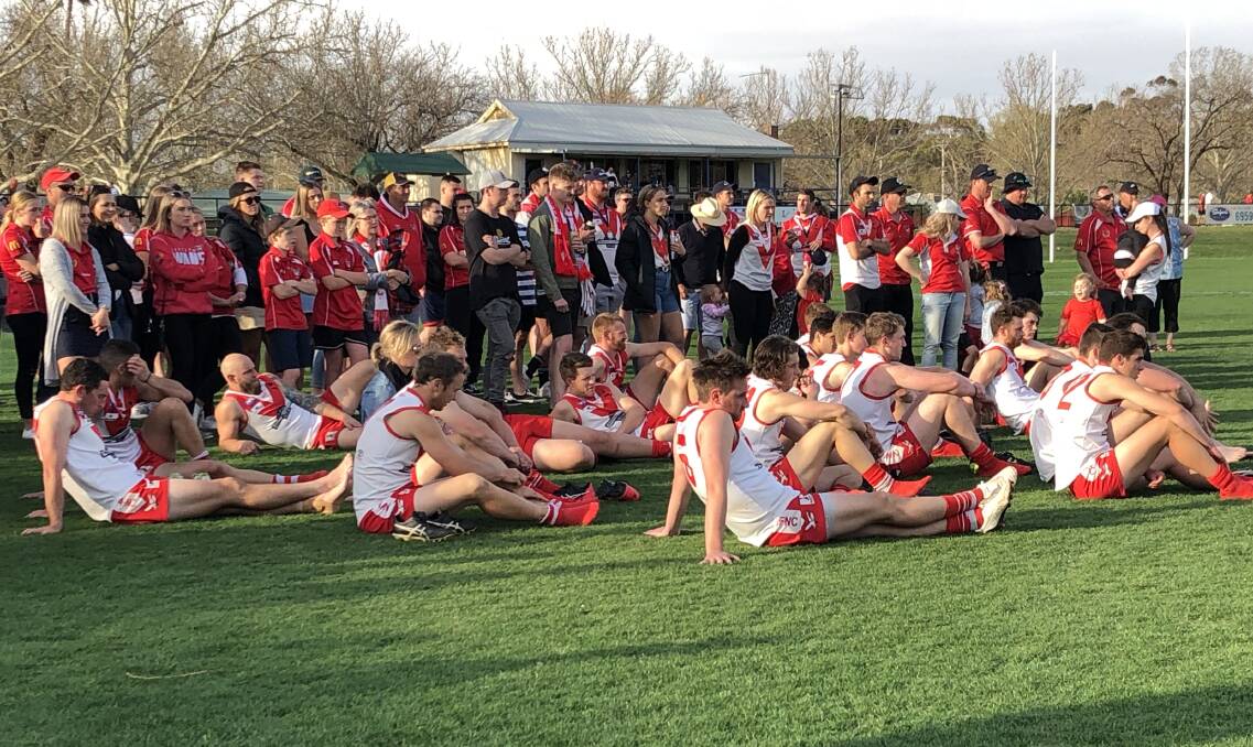 DEVASTATED: Griffith players comprehend a second straight grand final defeat at Narrandera Sportsground on Saturday. Picture: Matt Malone