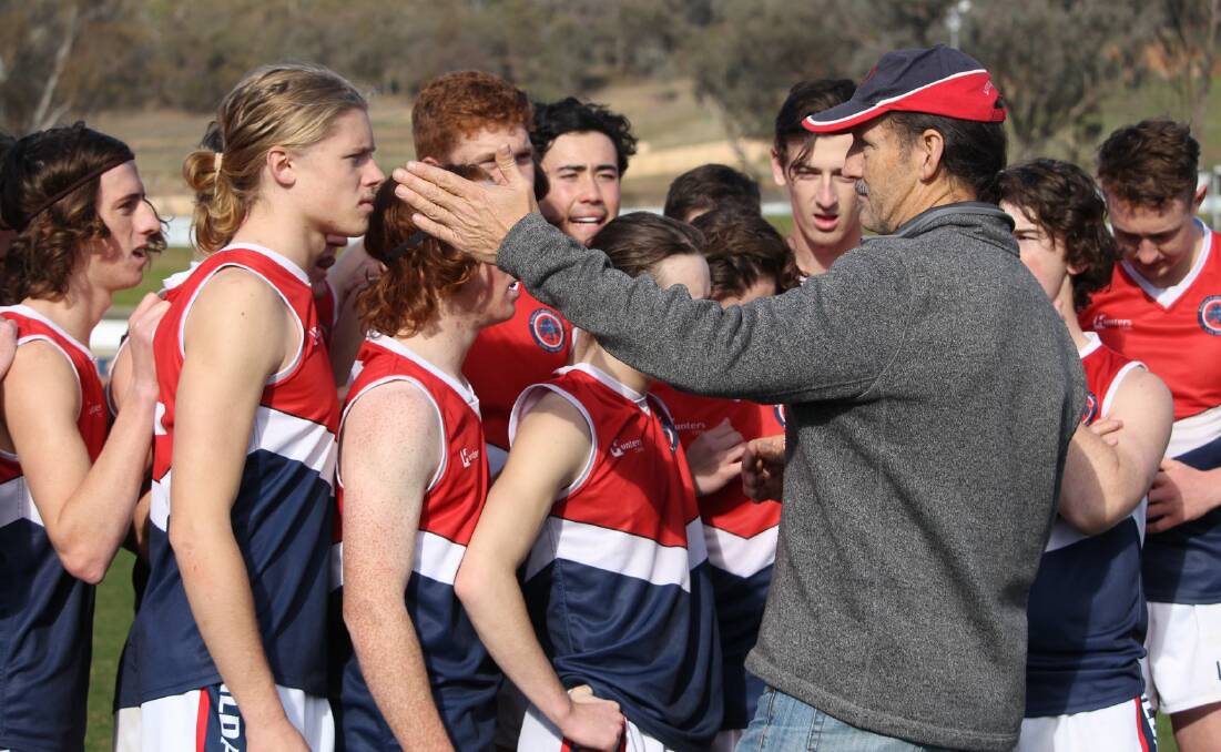 CLOSE CALL: Kildare Catholic College coach Peter Gaffney talks to his players during the state final at Lavington on Wednesday. Picture: Sarah Braybon