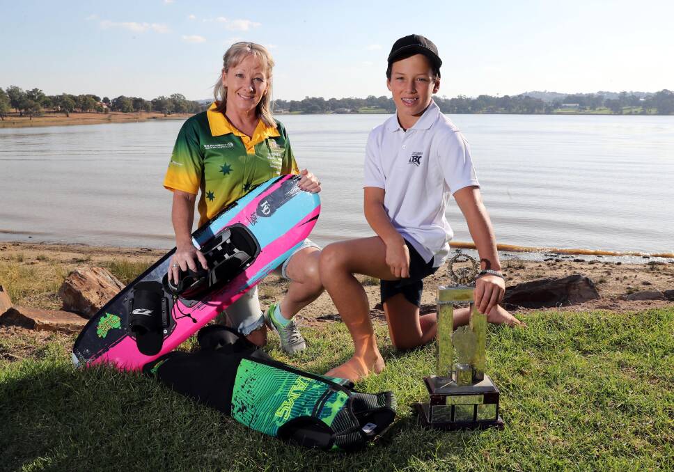 RUNS IN THE FAMILY: Cherie Buck with 12-year-old son
Joel, who have both claimed Australian titles and are off
to world championships overseas. Picture: Les Smith