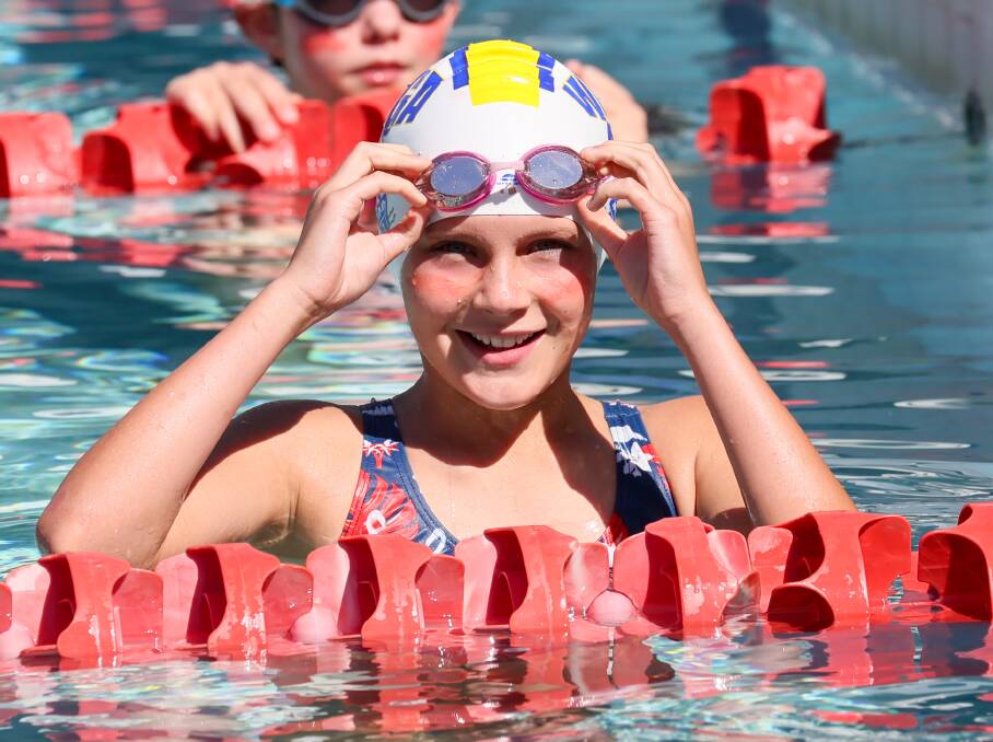 Leni Stenhouse is all smiles after winning the 12 years girls 50m freestyle at St Joseph's Primary School swimming carnival on Thursday. Picture by Les Smith