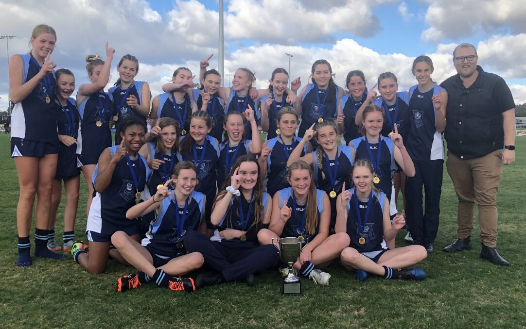 NUMBER ONE: Wagga High School celebrate their under 15 girls win at Robertson Oval on Wednesday. Picture: Matt Malone