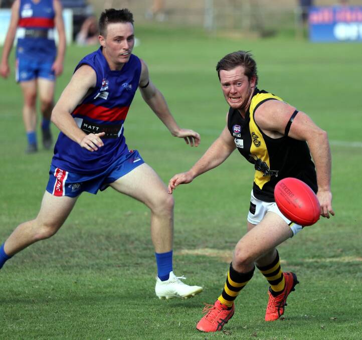 HOT FOOTY: Turvey Park's Riley Browning and
Wagga Tigers' Grant Daly compete for the ball
during the Good Friday Riverina League fixture
at Maher Oval. Picture: Les Smith