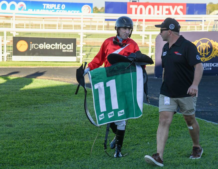 Jason Lyon and Craig Widdison discuss the win of The Prodigal Son on Sunday. Picture by Bernard Humphreys