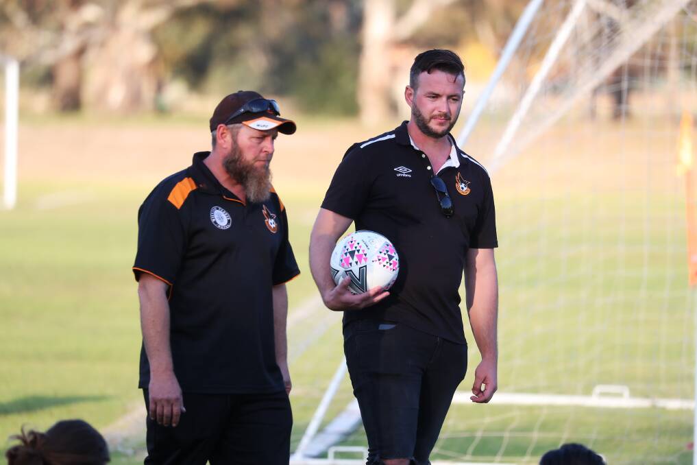 Aaron Mo'ane (right) with fellow Wagga United co-coach Scott Rohrich.