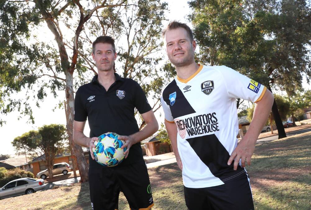 NEW ERA: Wagga City Wanderers co-captains Robert Fry and Carl Pideski at the club's training session at Kessler Park on Thursday night. Picture: Les Smith