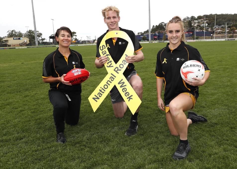 GOOD CAUSE: Transport for NSW's Trish Suckling with Collingullie-Glenfield Park footballer Sam Stening and East Wagga-Kooringal netballer Holly Nelson ahead of Road Safety Round. Picture: Les Smith