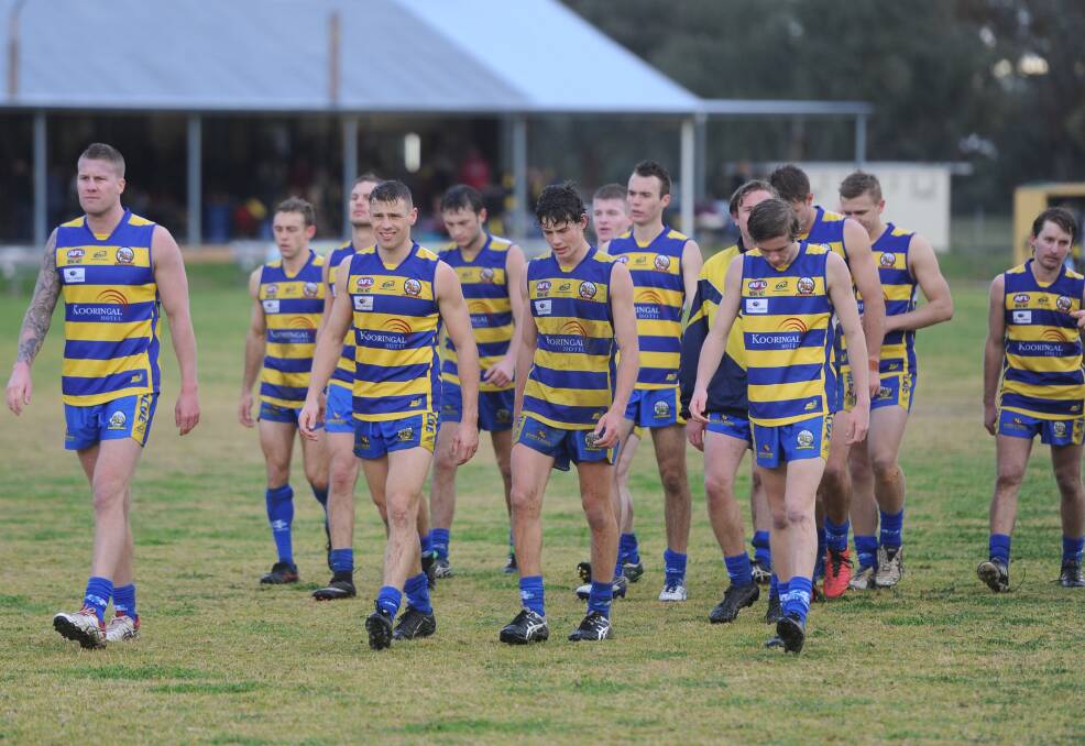 LAST TIME: MCUE players walk from the field the last time they met Griffith, on a wet day earlier in the year.