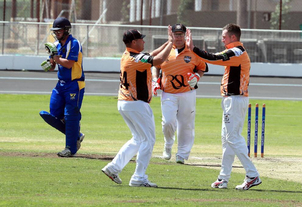 DETERMINED: Wagga RSL captain Sam Perry (right) celebrates a wicket against Kooringal Colts last month. Picture: Les Smith
