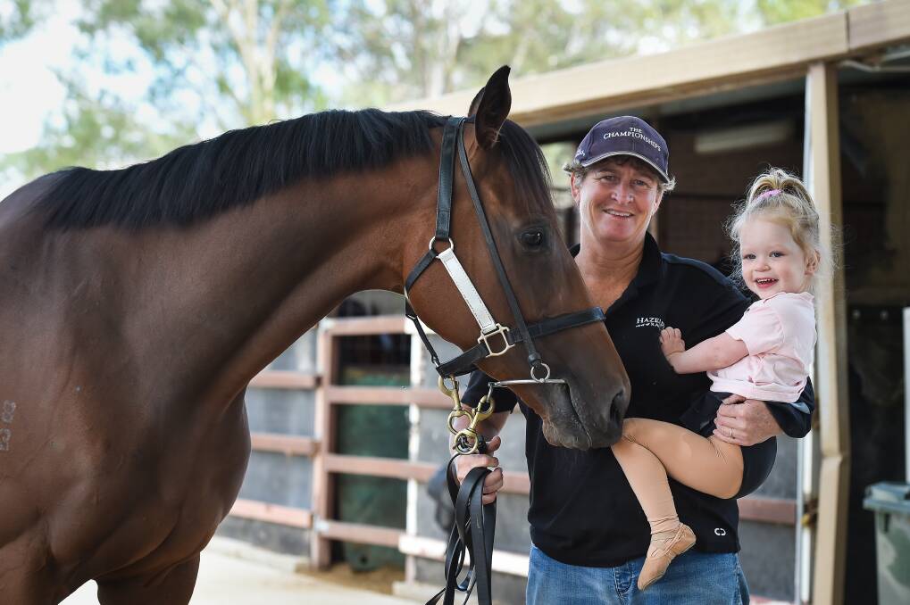 PRIMED: Trainer Donna Scott with her granddaughter, Penelope, and Bennelong Dancer who is set to contest a third Country Championship final at Randwick on Saturday. Picture: The Border Mail